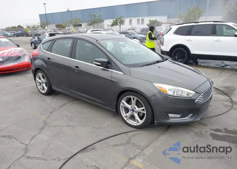 2015 Ford Focus Titanium z USA, uszkodzony, nr VIN 1FADP3N24FL386265